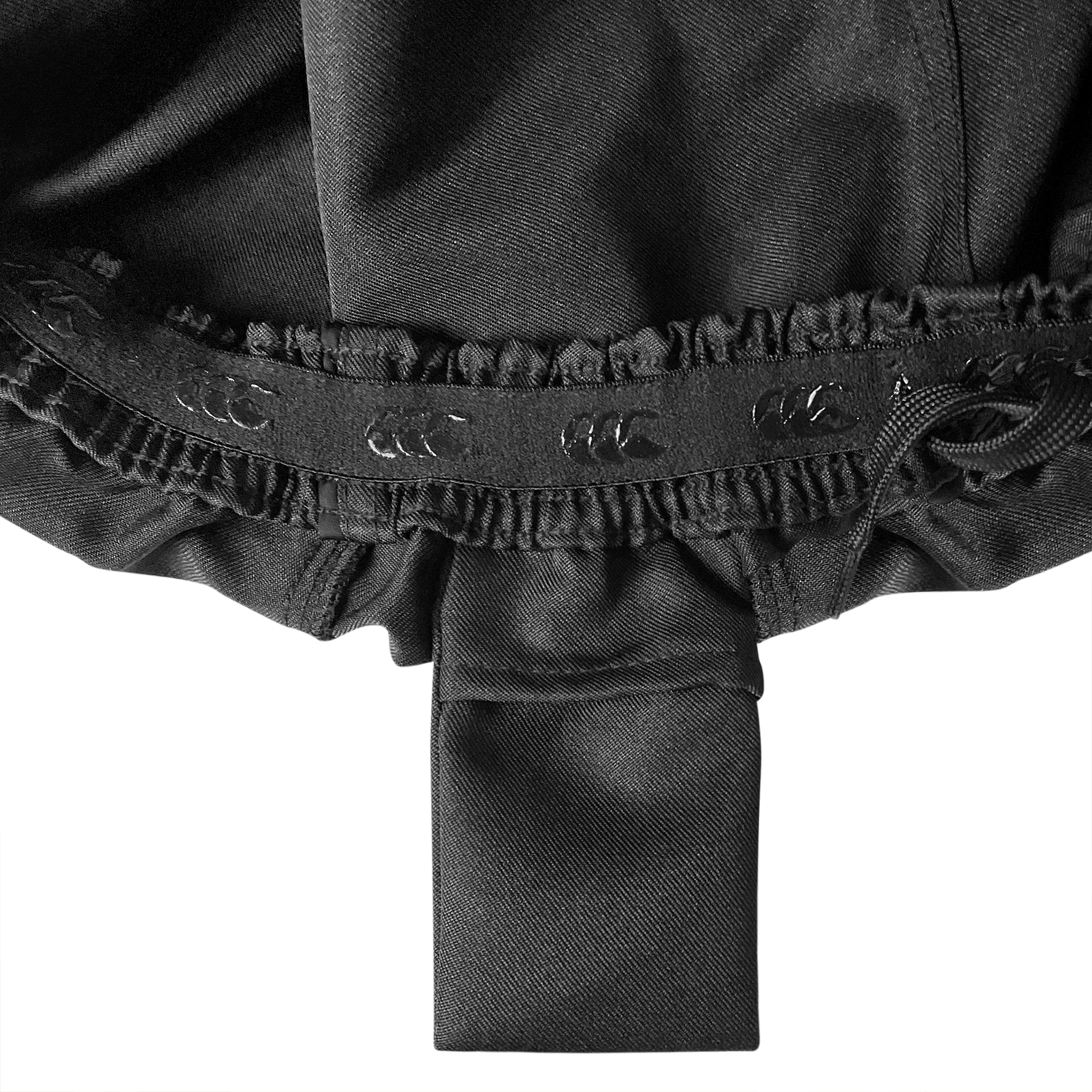 Inside waist band with rubberized Canterbury logo , drawstring and mouth guard pocket.