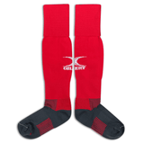Long red rugby socks with Gilbert logo mid calf, gray foot with red stripes on ankle and across the center of the sole.
