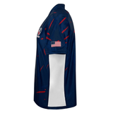 Side view of navy and red rugby jersey with white side panel and American flag on the left sleeve. 