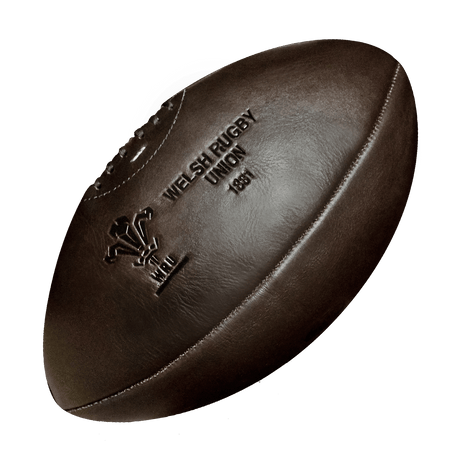 A Wales Rugby Vintage Leather Ball by Gilbert on a white background.