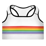 White sports bra with black piping and rainbow colored stripes across the middle. 