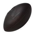A Gilbert All Blacks Vintage Leather Ball on a black background.