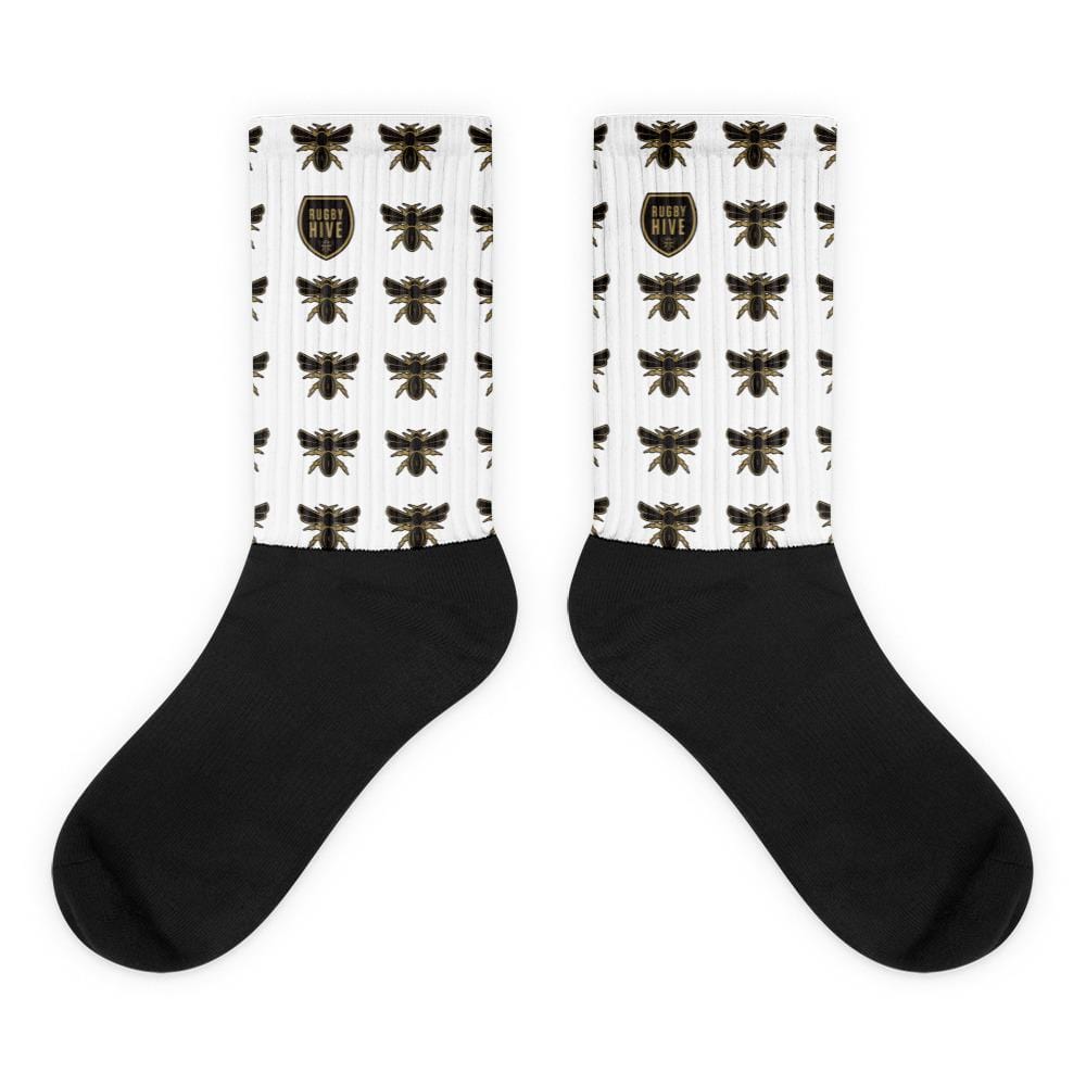 A pair of Rugby Hive Crew Socks with bees on them.