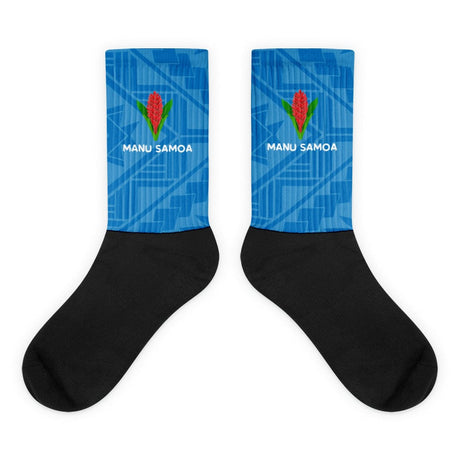 Crew socks with black feet and a blue on blue geometric design up the leg with a Manu Samoa logo.