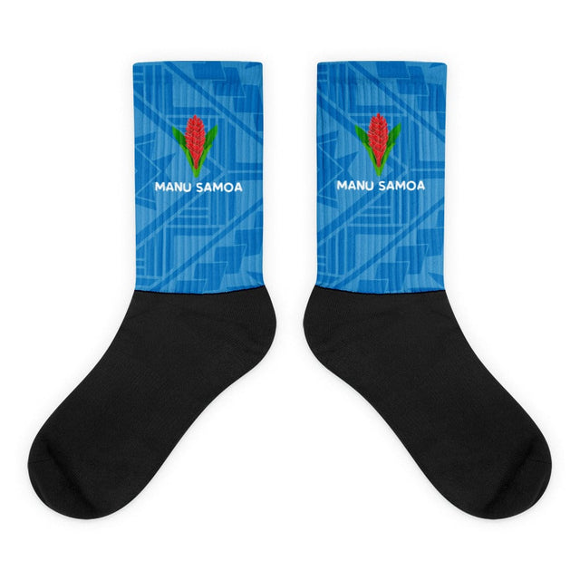 Crew socks with black feet and a blue on blue geometric design up the leg with a Manu Samoa logo.