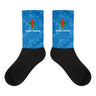 Crew socks with black feet and a blue on blue geometric design up the leg with a Manu Samoa logo.