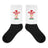 A pair of Wales Rugby Union Sublimated Crew Socks with black feet, white leg andthe WRU logo on it.