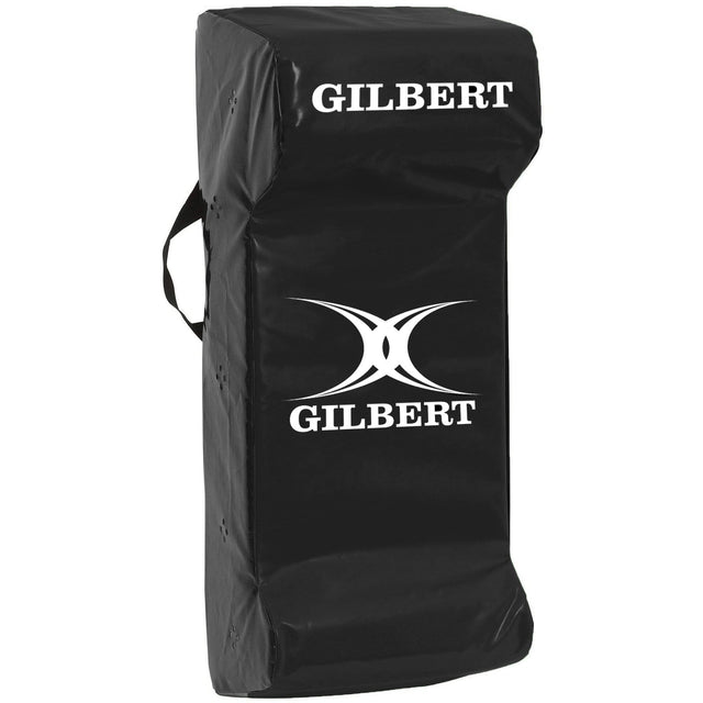 a Gilbert Junior Rugby Black Tackle Wedge with a white logo on it.
