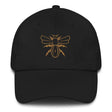 A Rugby Hive Cap with a gold bee embroidered on it.