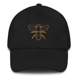 A Rugby Hive Cap with a gold bee embroidered on it.