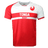 Tonga red and white round neck short sleeve jersey. White chest and left arm and sleeve trimmed in red. Right red shoulder and sleeve. Upper left chest adorned with Tonga flag. Red and white horizontal stripe across center of chest with white Tonga on red and red Rugby below on white stripe. Lower torso in red.