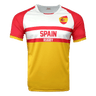 White round neck short sleeve jersey with red shoulders and arm sleeves trimmed in red. Flag of Spain on upper left shoulder, red stripes in the center with Spain in red and Rugby below in white in the red stripe. Torso is yellow.