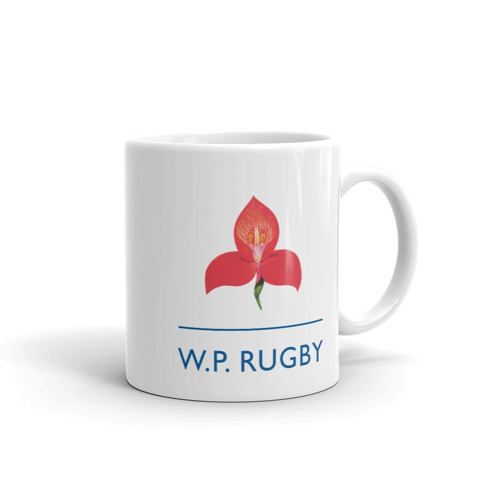 a W.P. Rugby Mug with a red flower on it.