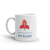 a W.P. Rugby Mug with a red flower on it.