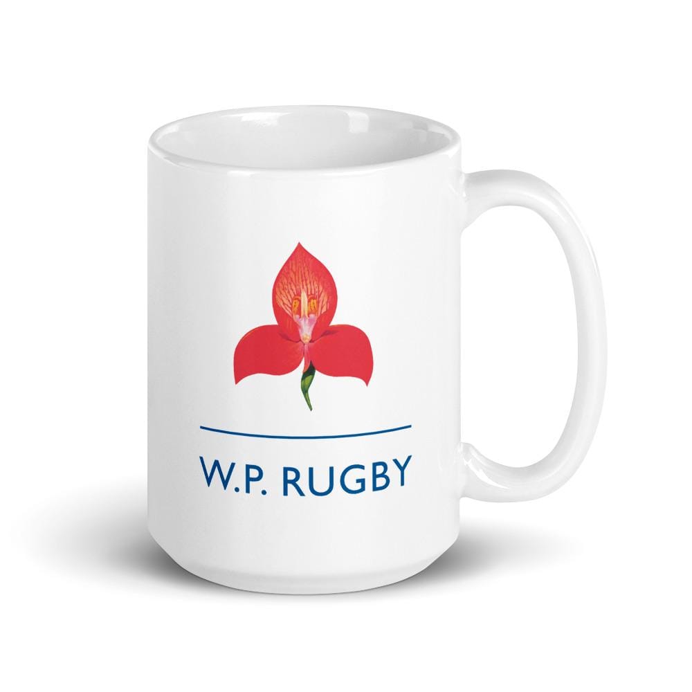 a W.P. Rugby Mug with a red flower on it.