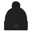 A Rugby Hive Pom-Pom Beanie with a gold bee on it.