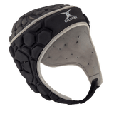 Gilbert XP 250 Rugby Headguard in black and gray, featuring an adjustable chin strap and hexagonal pattern for enhanced protection.
