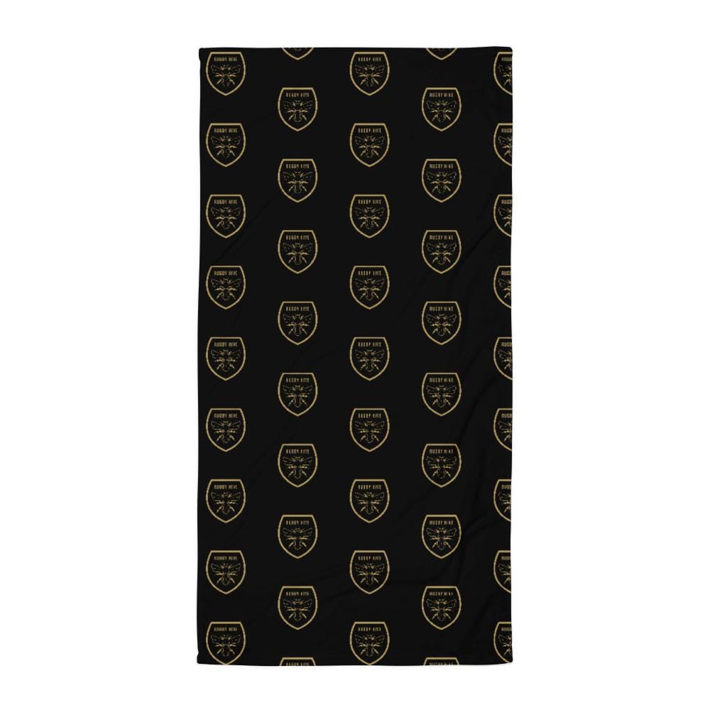A Rugby Hive Towel with a pattern of shields in black and gold.
