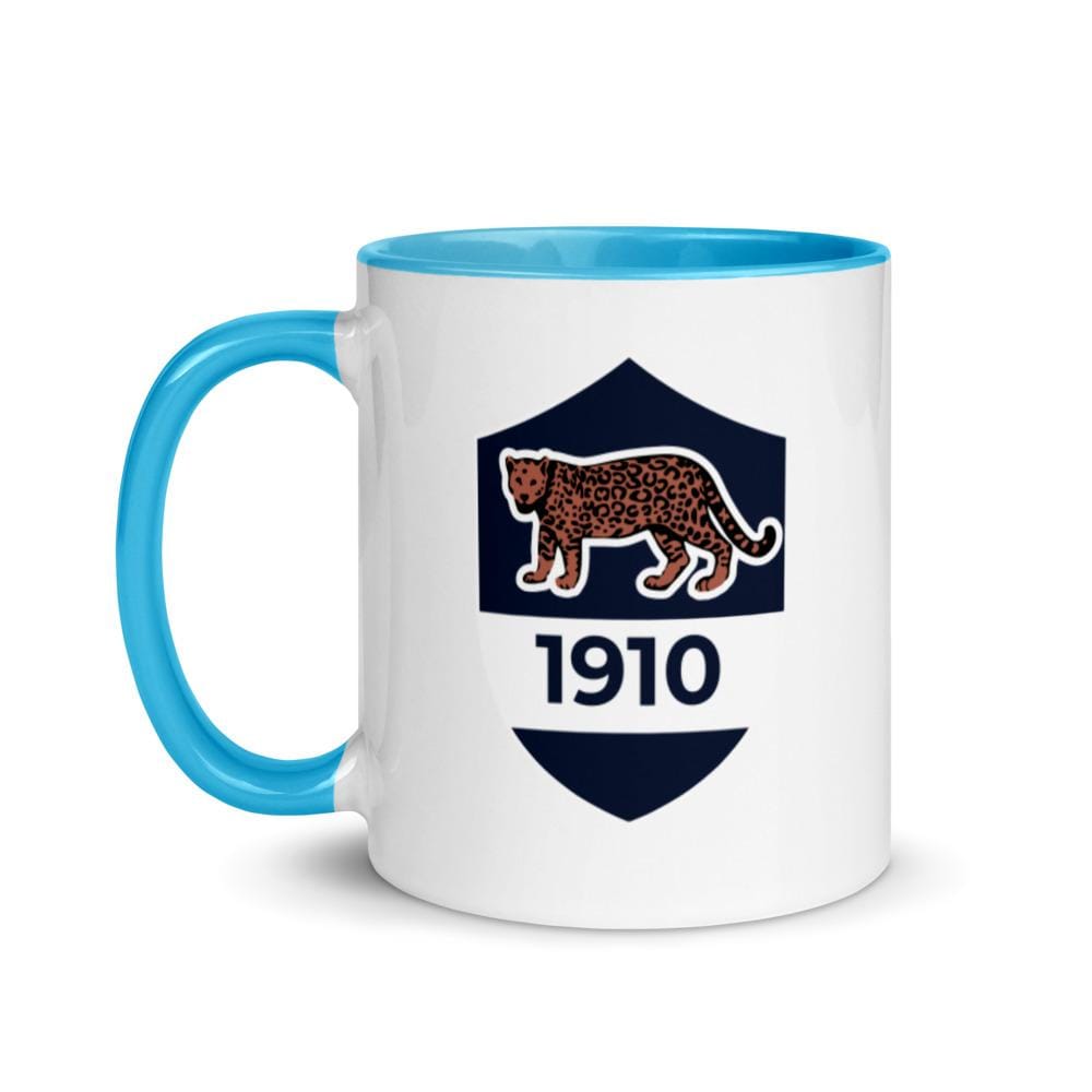 A Vintage 1910 Argentina Mug with a leopard on it.