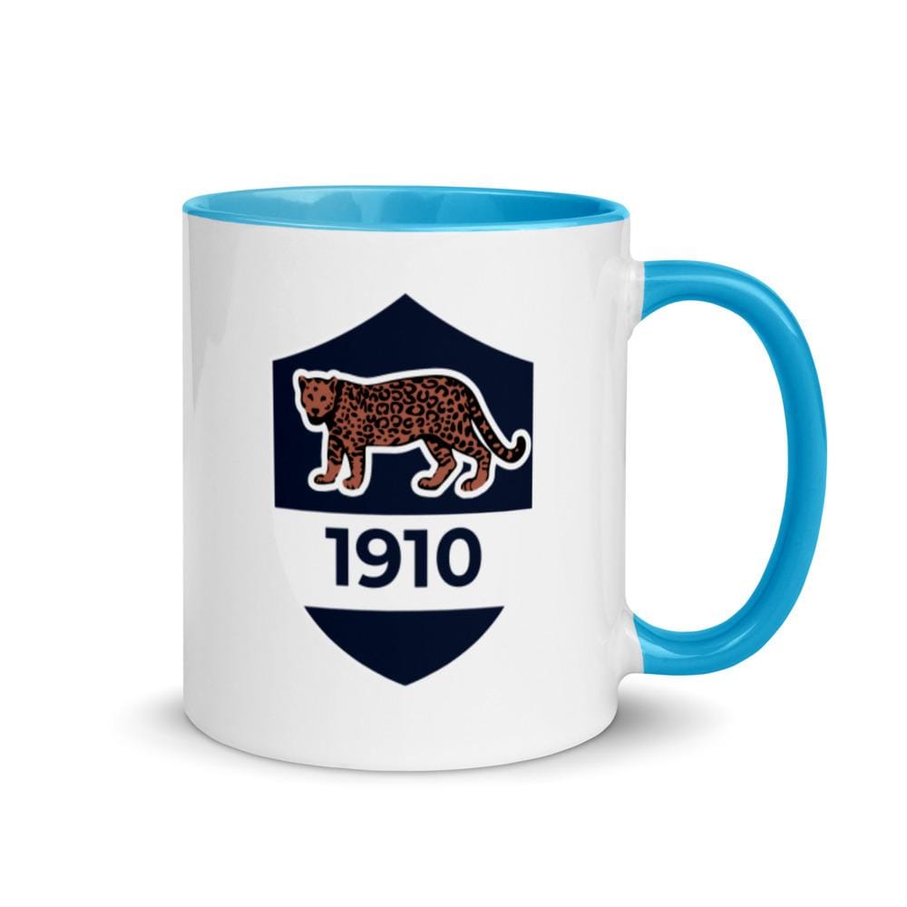 A Vintage 1910 Argentina Mug with a leopard on it.