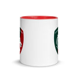 White ceramic mug red interior and a green, red and white Leicester Tigers logo on each side.