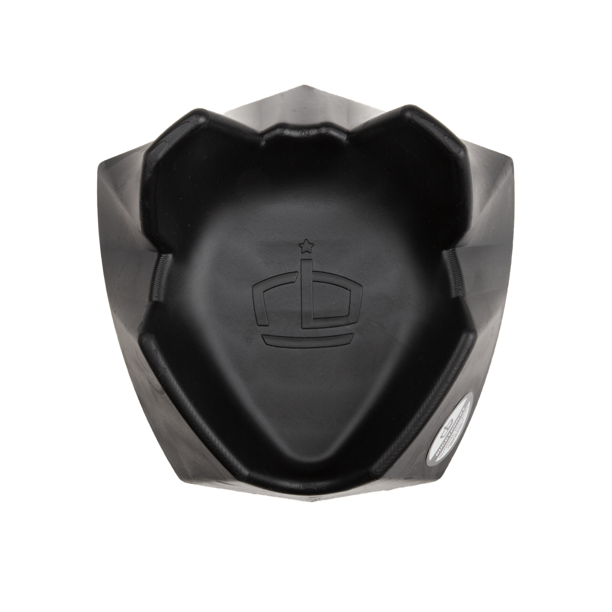 Top view of black kicking tee with Rugby Bricks logo in the center.