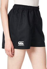 A person wearing Women's Canterbury Advantage Pro Rugby Shorts in black, made from durable polyester, with a stylish logo on the left leg and offering excellent moisture management.