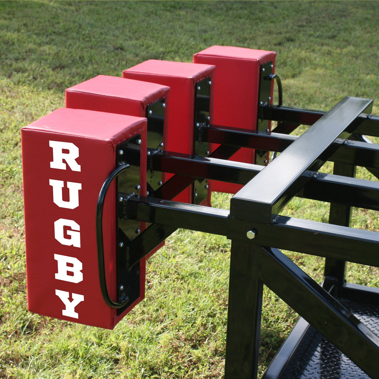 Side View of Black Steel Scrum Sled With Red Foam Pads